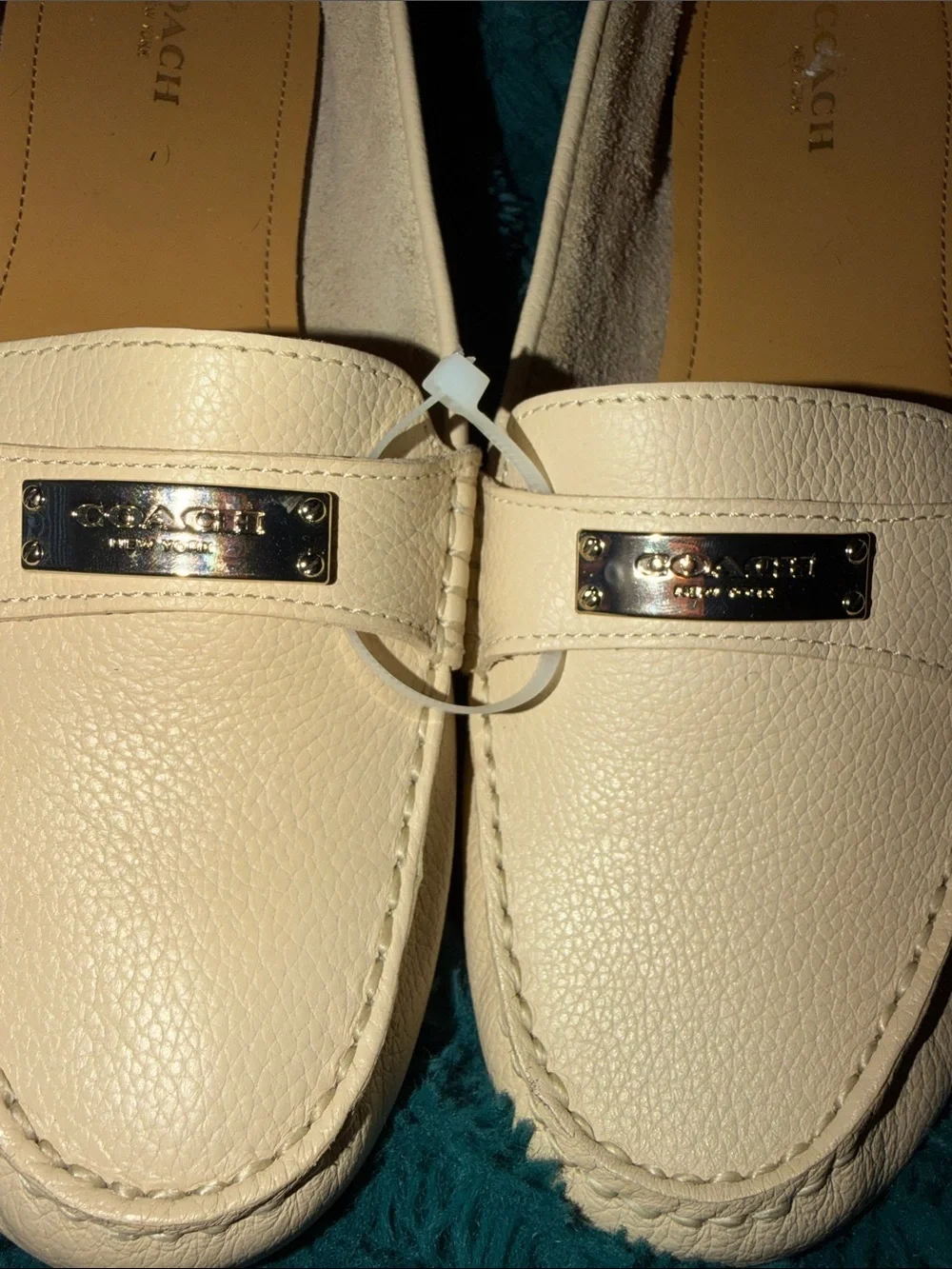 Coach Cream Leather Slip-On Loafers with Silver Metal Plaque 9.5